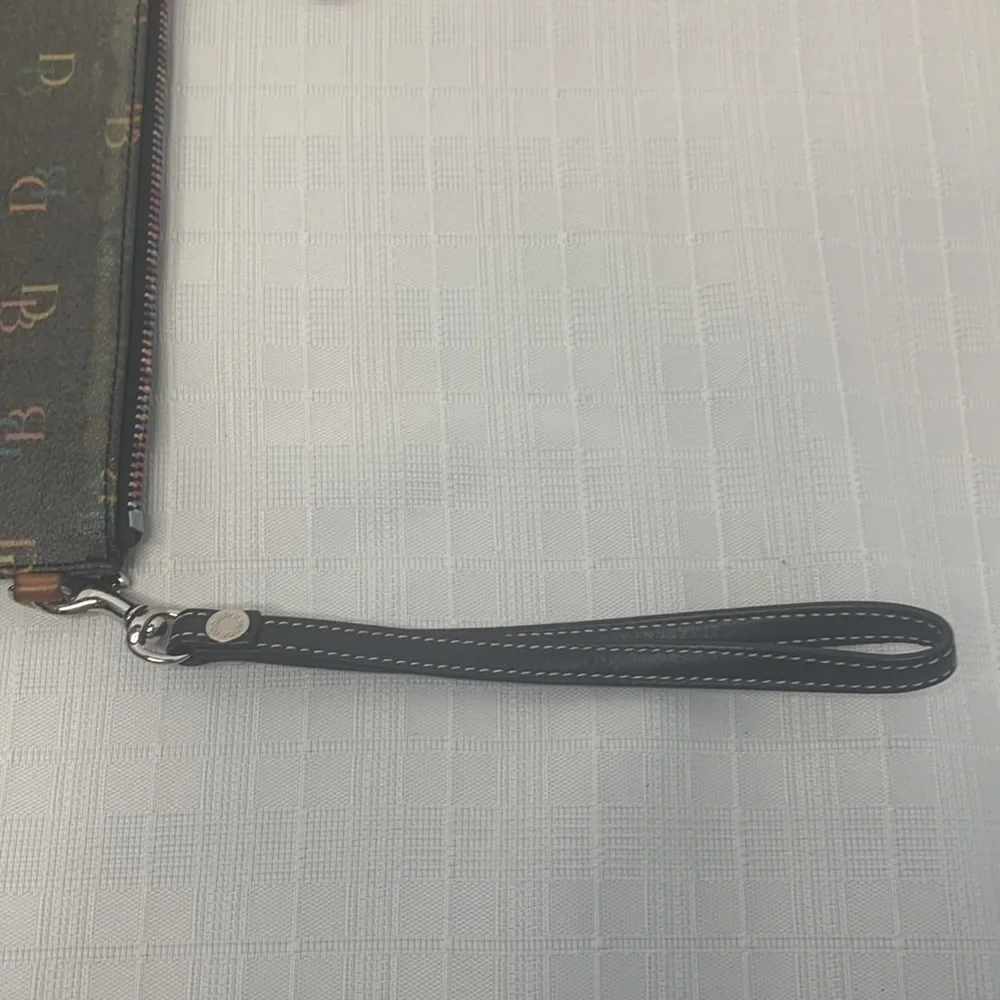 Vintage Dooney and Bourke oversized wristlet with rainbow zipper